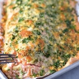 Baked Salmon with Parmesan Herb Crust Recipe on white plate.