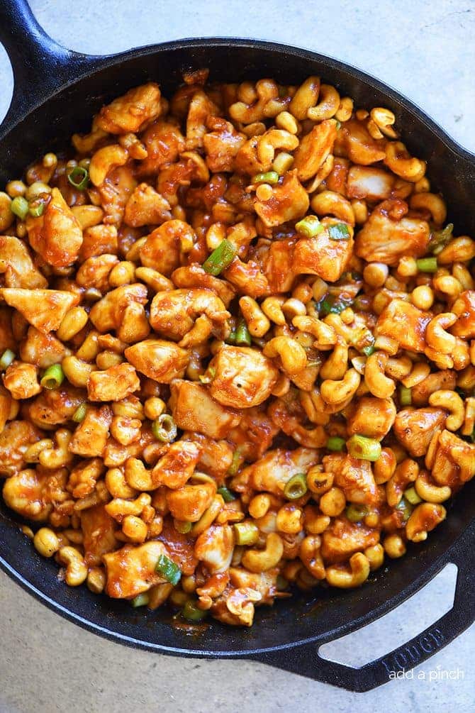 Skillet holds cashew chicken ready to serve.