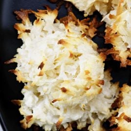 Easy Coconut Macaroons Recipe - Theseย easy coconut macaroons are made with just five ingredients. Golden brown, they are light, chewy and filled with flavorful coconut! // addapinch.com