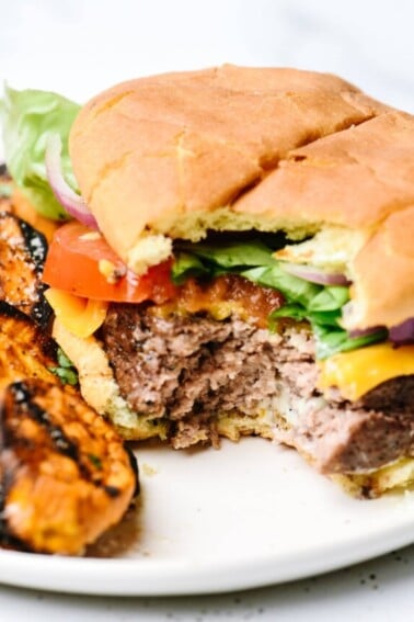 Just 2 ingredients is all you need to take the usual burger recipe the next level for the BEST beef hamburgers I've ever tasted.