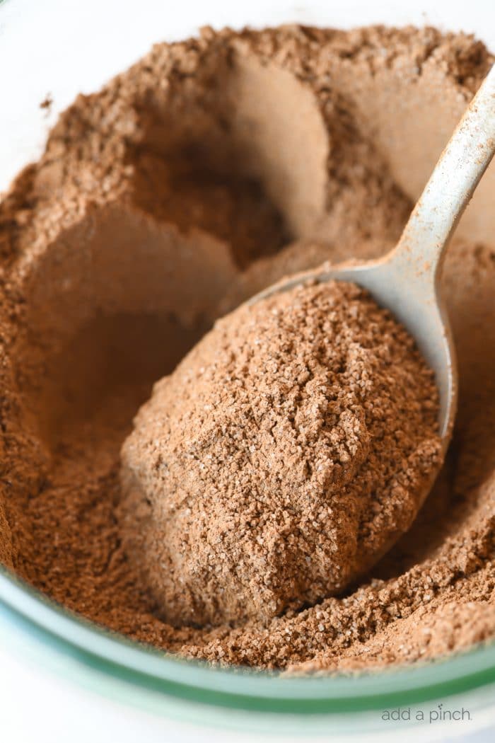 Photograph of hot cocoa mix in a glass jar.