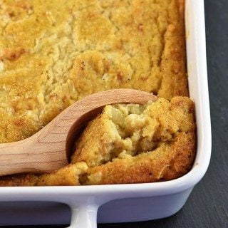 Southern Cornbread Dressing makes a comforting, classic dish for the holidays!ย Moist and delicious, cornbread dressing makes the perfect side dish! // addapinch.com